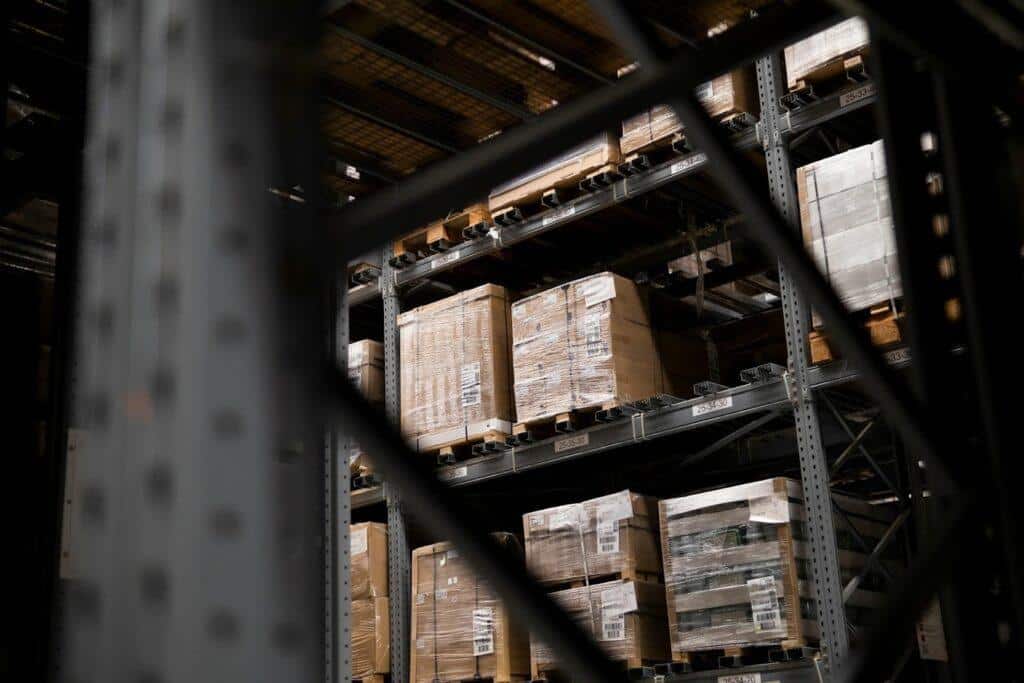 Pallets of goods and products stored in commercial warehouse racking